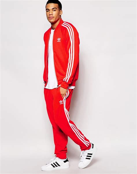 roter adidas jogginganzug herren|Rote adidas Trainingsanzüge & Jogginganzüge online .